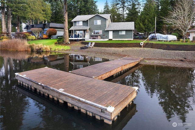 view of dock featuring a water view