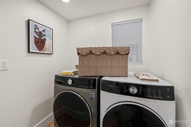 laundry area featuring washing machine and dryer