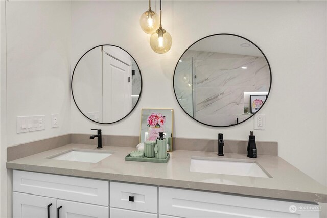 bathroom featuring vanity and walk in shower