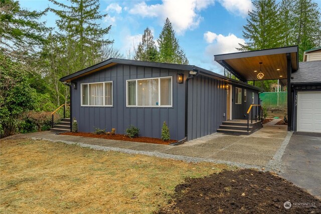 view of side of property with a garage