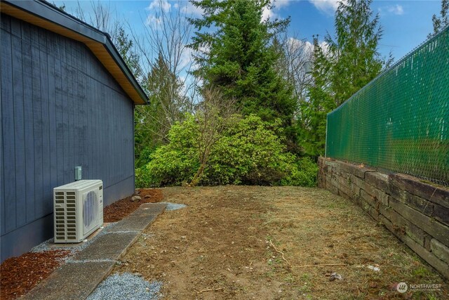 view of yard featuring ac unit