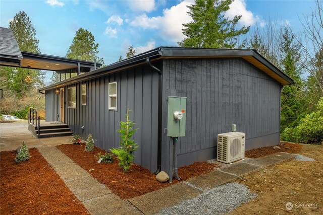 view of home's exterior featuring ac unit