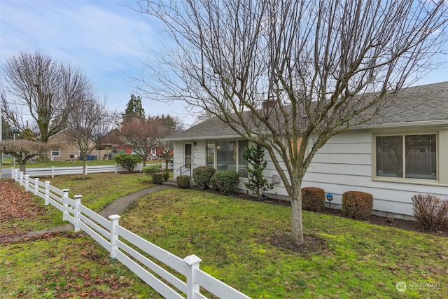 exterior space with a front lawn