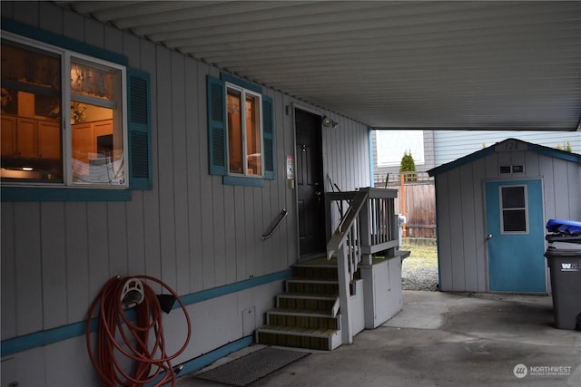 exterior space featuring a patio and a storage unit