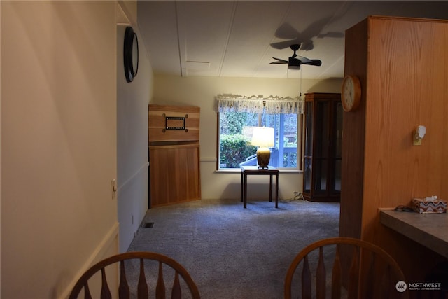 interior space featuring ceiling fan