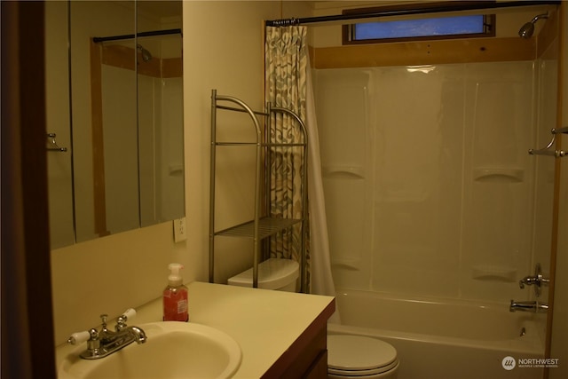 full bathroom featuring toilet, shower / tub combo, and vanity