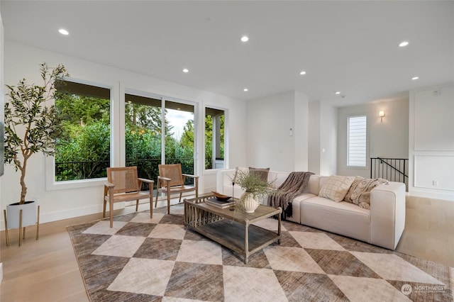 living room featuring light hardwood / wood-style floors and plenty of natural light