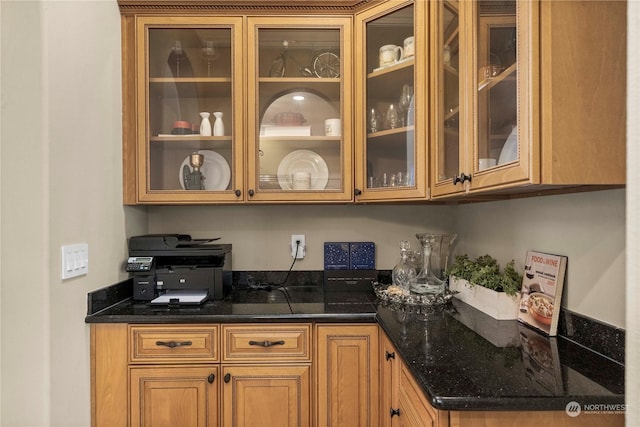 interior space with dark stone counters