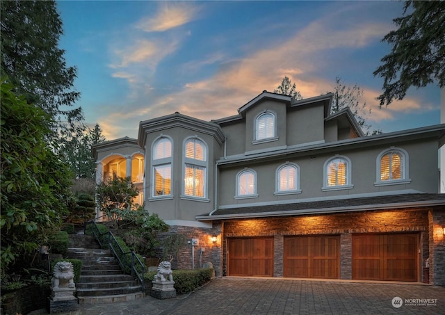 view of front of property with a garage