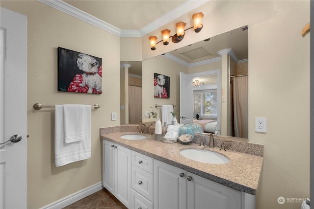 bathroom featuring vanity, crown molding, and tile patterned floors