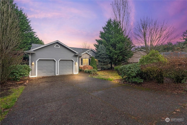 view of front of home featuring a garage