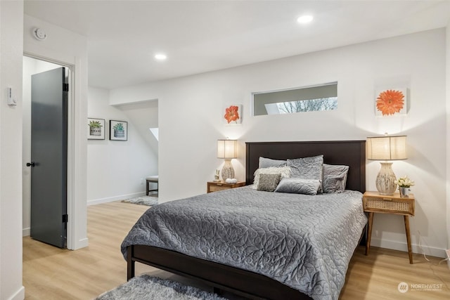 bedroom featuring light hardwood / wood-style flooring