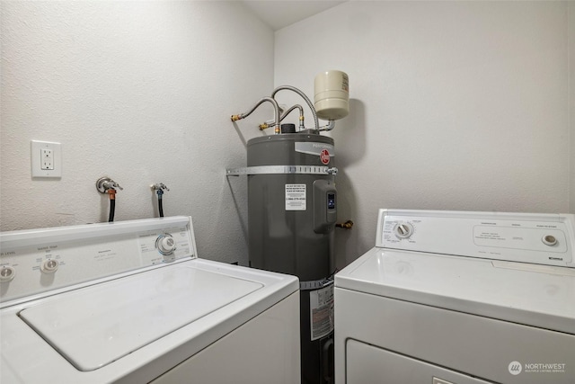 washroom with secured water heater and washer and clothes dryer