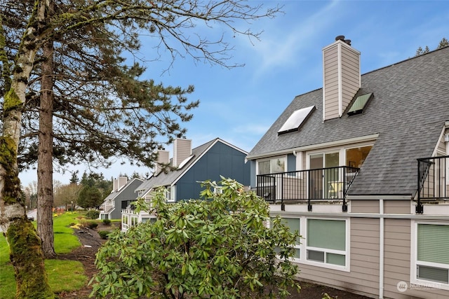 view of property exterior with a balcony