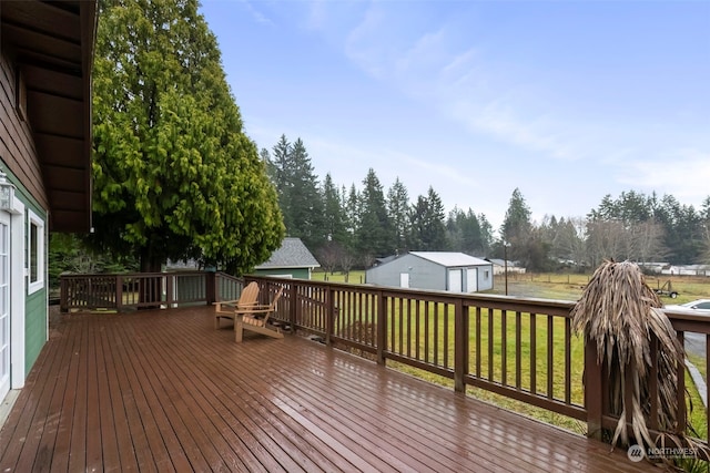 deck featuring a lawn