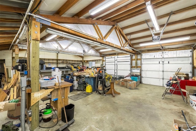 garage with metal wall and a garage door opener