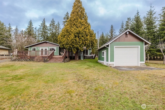 exterior space featuring a garage, driveway, and a deck