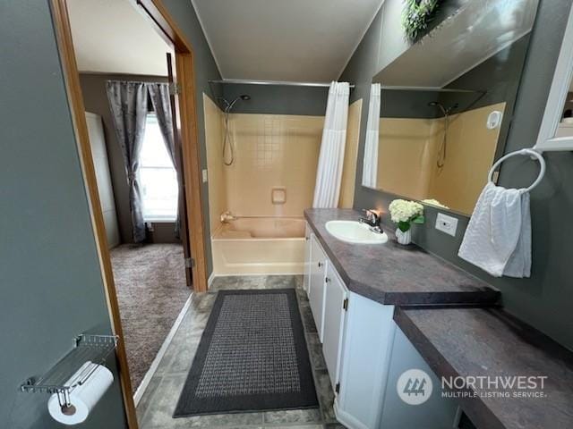 bathroom with shower / bathtub combination with curtain and vanity