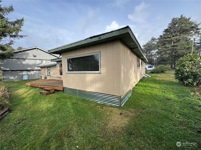 4757 State Route 109, Moclips, WA 98562 - view of property exterior with a deck and a lawn