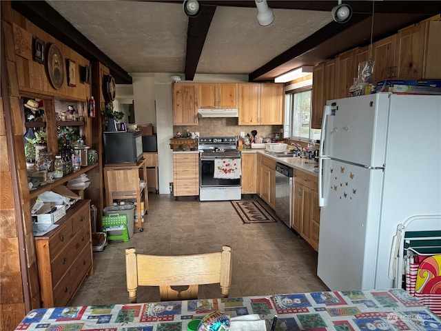 4757 State Route 109, Moclips, WA 98562 - kitchen featuring white appliances, under cabinet range hood, light countertops, beamed ceiling, and decorative backsplash