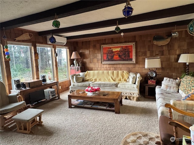 4757 State Route 109, Moclips, WA 98562 - carpeted living room featuring wooden walls, an AC wall unit, and beamed ceiling