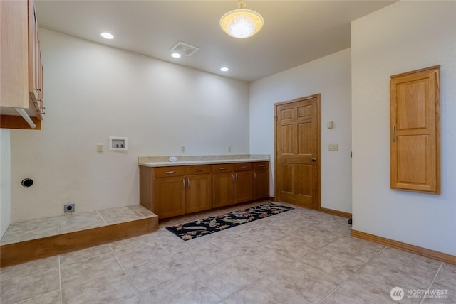 1078 Gardena Creek Rd, Touchet, WA 99360 - laundry room with hookup for an electric dryer, hookup for a washing machine, baseboards, and cabinet space