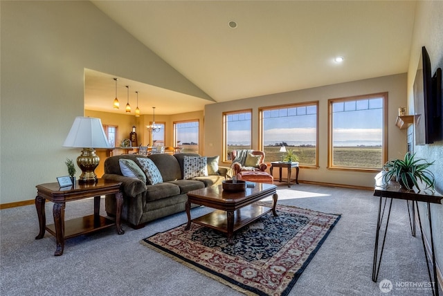 1078 Gardena Creek Rd, Touchet, WA 99360 - living room with carpet floors, vaulted ceiling, and baseboards