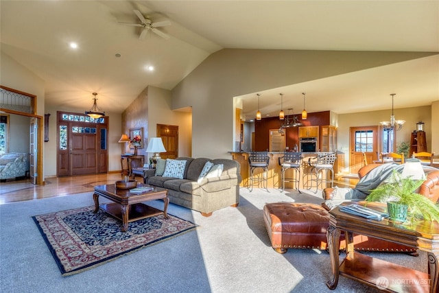 1078 Gardena Creek Rd, Touchet, WA 99360 - carpeted living area with a ceiling fan, high vaulted ceiling, a chandelier, and recessed lighting