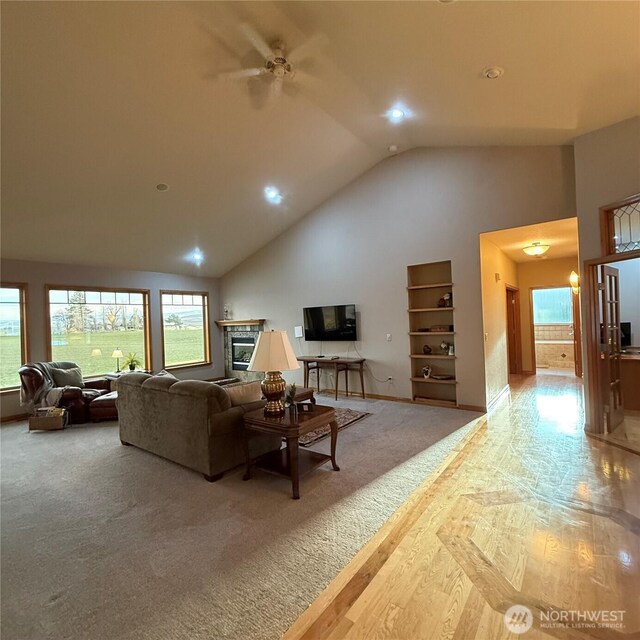 1078 Gardena Creek Rd, Touchet, WA 99360 - living room with high vaulted ceiling, a ceiling fan, wood finished floors, baseboards, and recessed lighting