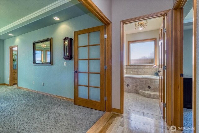 1078 Gardena Creek Rd, Touchet, WA 99360 - hall featuring healthy amount of natural light, baseboards, and a chandelier