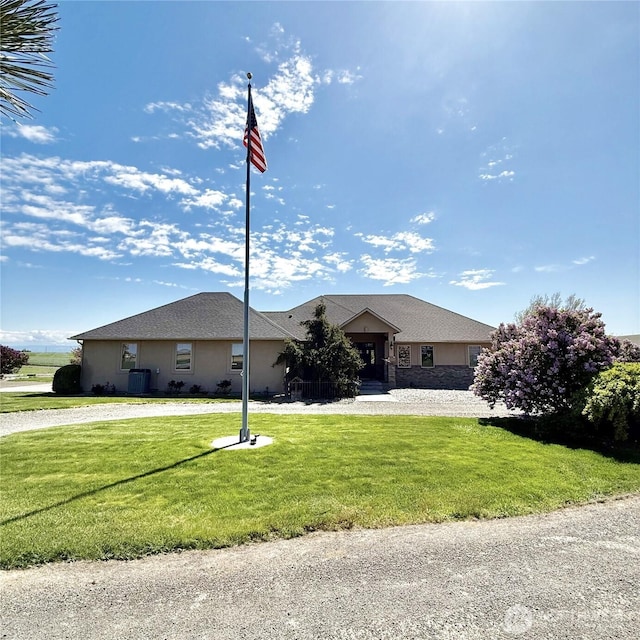 1078 Gardena Creek Rd, Touchet, WA 99360 - ranch-style home featuring a front lawn, central AC, and stucco siding