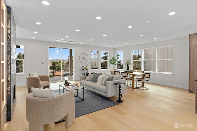 living room with light hardwood / wood-style floors