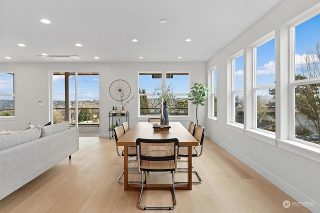 dining room with light wood-type flooring