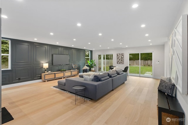 living room with light hardwood / wood-style floors