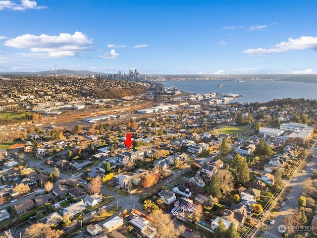 drone / aerial view with a water view