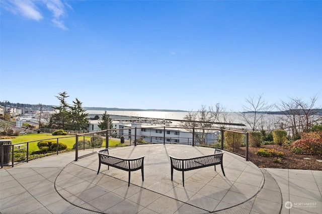 view of patio / terrace with a water view