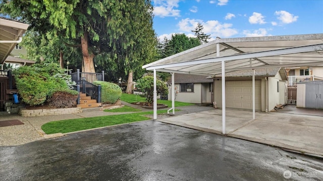 view of parking / parking lot with a garage and driveway