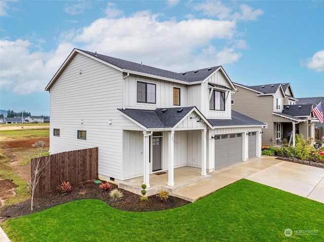 modern farmhouse featuring a garage and a front lawn