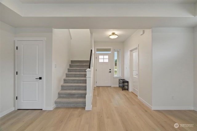 entryway with light hardwood / wood-style floors