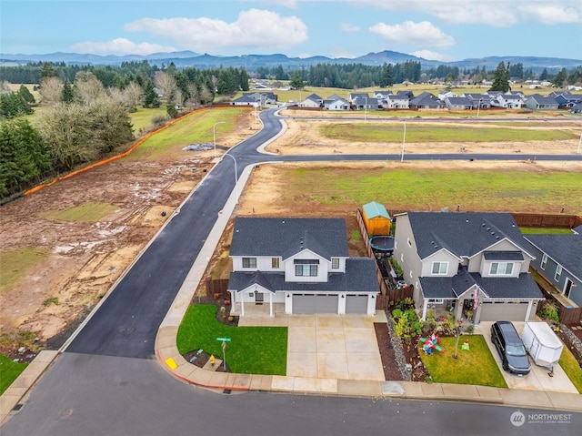 bird's eye view with a mountain view