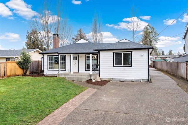 ranch-style house with a front yard