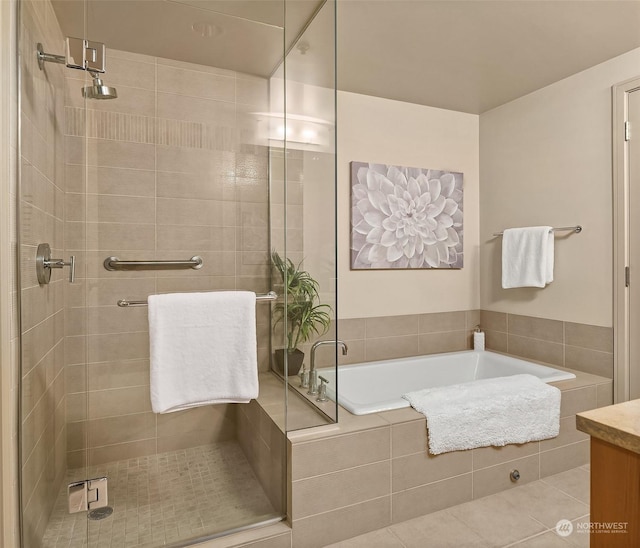 bathroom featuring vanity, tile patterned floors, and independent shower and bath