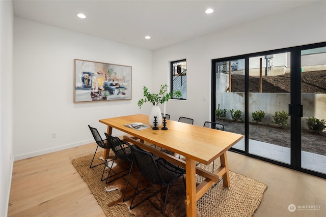 dining space featuring light hardwood / wood-style flooring