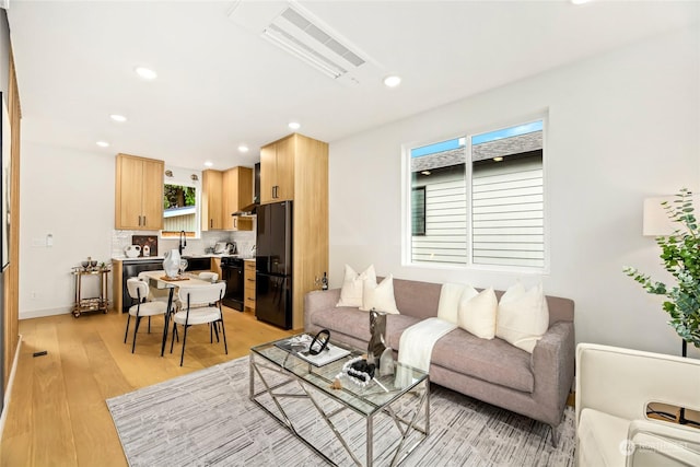 living room featuring light hardwood / wood-style floors