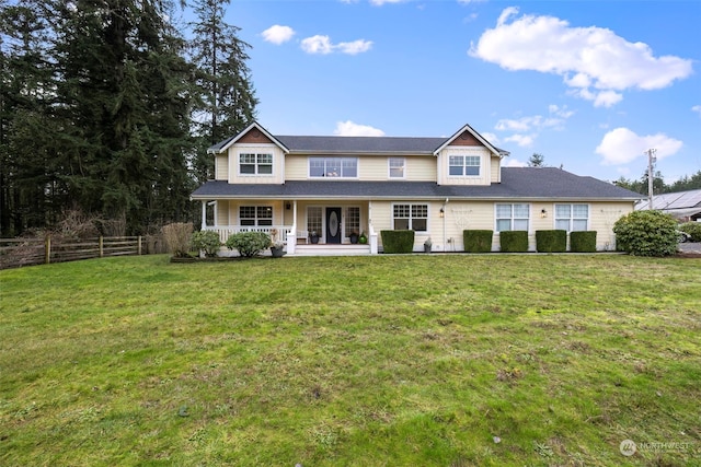 view of front of home featuring a porch and a front lawn