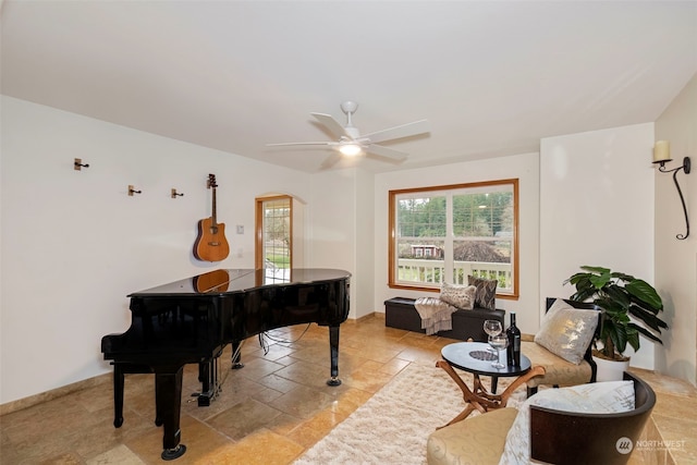 miscellaneous room featuring ceiling fan