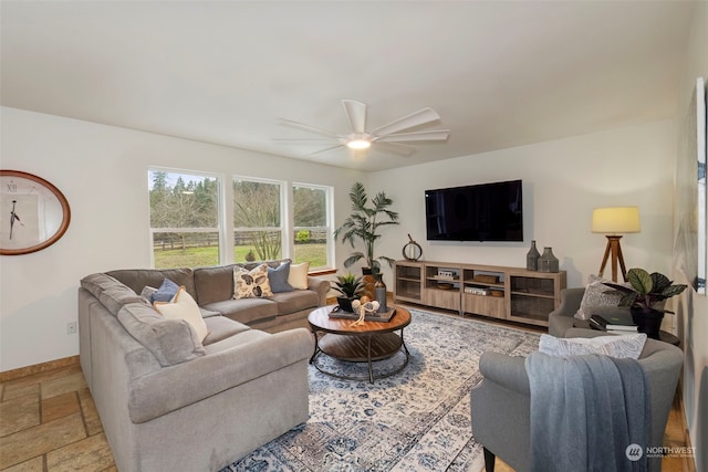 living room featuring ceiling fan