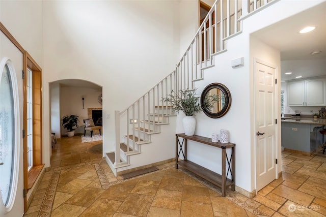 foyer featuring a high ceiling