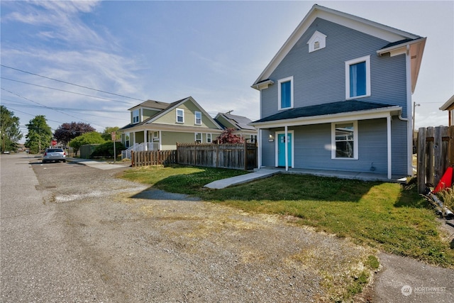 front of property featuring a front lawn