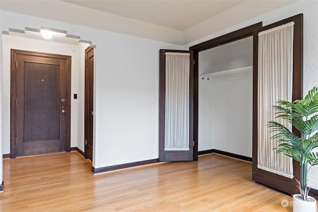 unfurnished bedroom featuring light hardwood / wood-style flooring